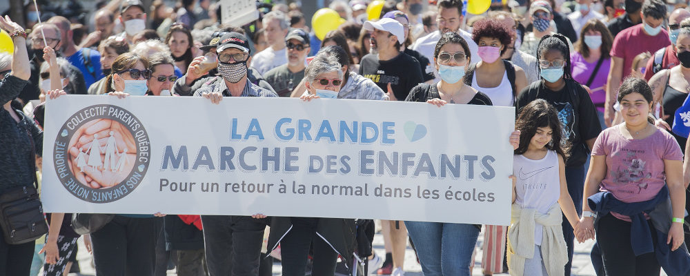 People take part in a demonstration in Montreal opposing the Quebec government's measures to curb the spread of Covid-19. Graham Hughes/The Canadian Press