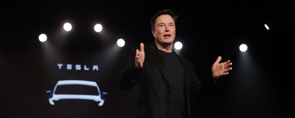 Tesla CEO Elon Musk speaks before unveiling the Model Y at Tesla's design studio in Hawthorne, California. Jae C. Hong/AP Photo