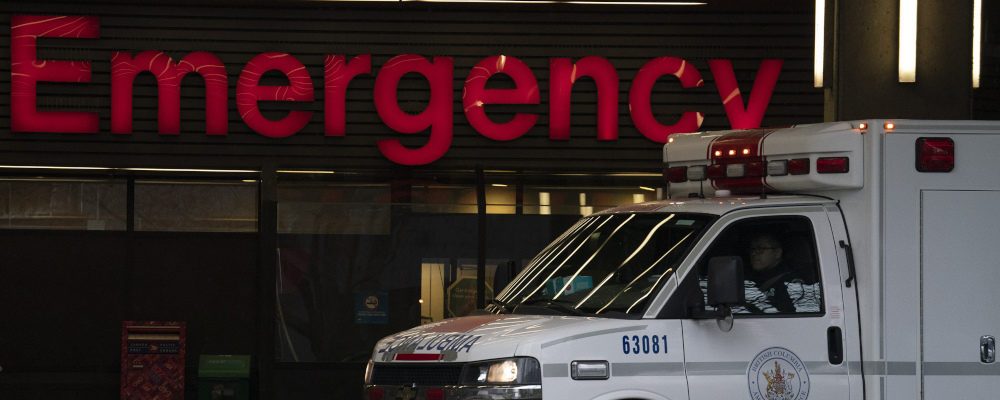 A ambulance drives past the emergency entrance of Vancouver General Hospital on April 9, 2021. Jonathan Hayward/The Canadian Press