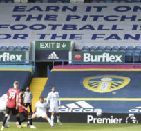 A banner referring to the aborted European Super League is displayed during a match between Leeds United and Manchester United on April 25, 2021. Peter Powell/AP