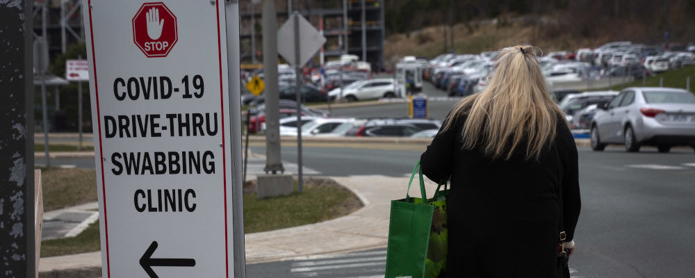 A visitor walks towards the Janeway Childrens Hospital in St. John's NL on Thursday, May 6, 2021. Paul Daly/The Canadian Press