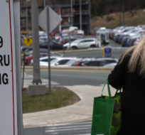 A visitor walks towards the Janeway Childrens Hospital in St. John's NL on Thursday, May 6, 2021. Paul Daly/The Canadian Press