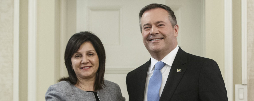 Premier Jason Kenney shakes hands with Education Minister Adriana LaGrange on April 30, 2019. Jason Franson/The Canadian Press