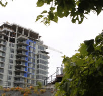 A condominium building under construction in Victoria, B.C., on June 1, 2018. Chad Hipolito/The Canadian Press.