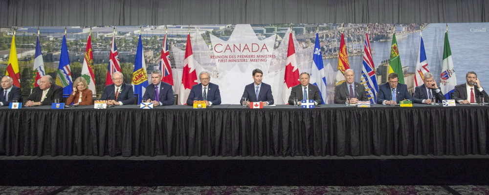 Canadian premiers and Prime Minister Justin Trudeau speak to the media at the first ministers closing news conference on December 7, 2018 in Montreal. Ryan Remiorz/The Canadian Press.