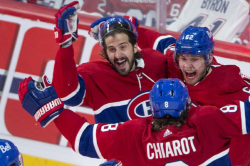 Montreal Canadiens players celebrate after scoring the winning goal against the Vegas Golden Knights on June 24, 2021. Ryan Remiorz/The Canadian Press.
