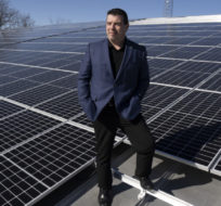 Matt Jamieson, President and CEO, Six Nations of the Grand River Development Corporation, is photographed atop the roof of the Six Nations Bingo hall that is presently being refitted with solar panels at the Six Nations of the Grand River, Ont. on Thursday, March 4, 2021. Peter Power/The Canadian Press.