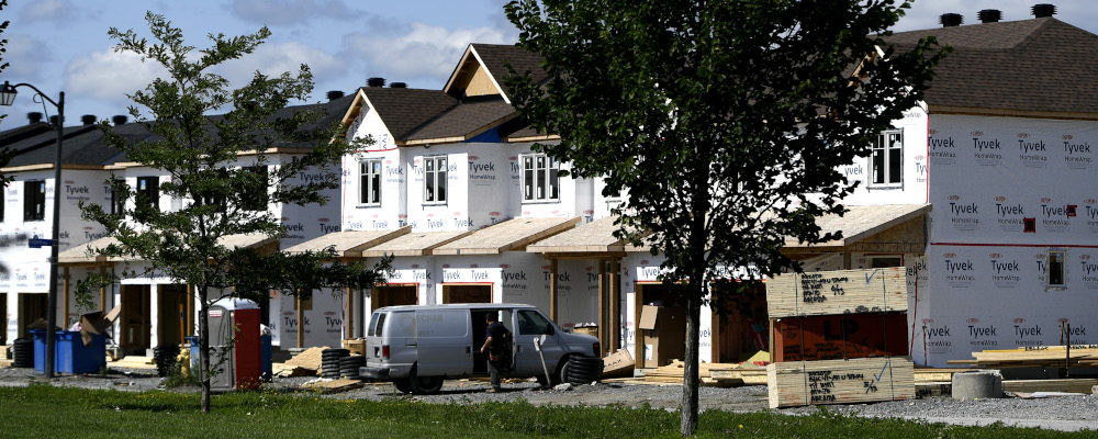 Home under construction are seen in a new subdivision in the Ottawa suburb of Kanata, on Friday, July 30, 2021. Justin Tang/The Canadian Press.