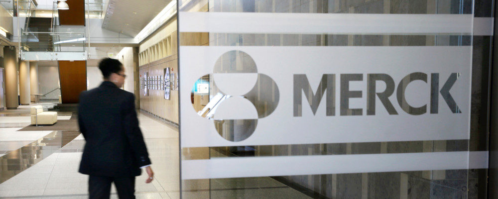 In this Dec. 18, 2014 file photo, a person walks through a Merck company building in Kenilworth, N.J. Mel Evans/AP Photo.