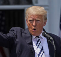 Former President Donald Trump imitates the shooting of a gun with his finger while talking about gun violence in Chicago as he speaks at Trump National Golf Club in Bedminster, N.J., Wednesday, July 7, 2021. Seth Wenig/AP Photo.
