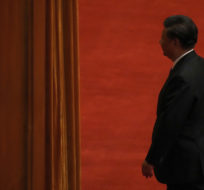 Chinese President Xi Jinping leaves after delivering a speech at an event commemorating the 110th anniversary of Xinhai Revolution at the Great Hall of the People in Beijing Oct. 9, 2021. Andy Wong/AP Photo.