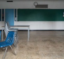 A classroom is seen in the former New Westminster Secondary School, which was built on a cemetery in the 1940s and is now shuttered after a new school was built nearby, in New Westminster, B.C., on Thursday, October 14, 2021. Darryl Dyck/The Canadian Press.