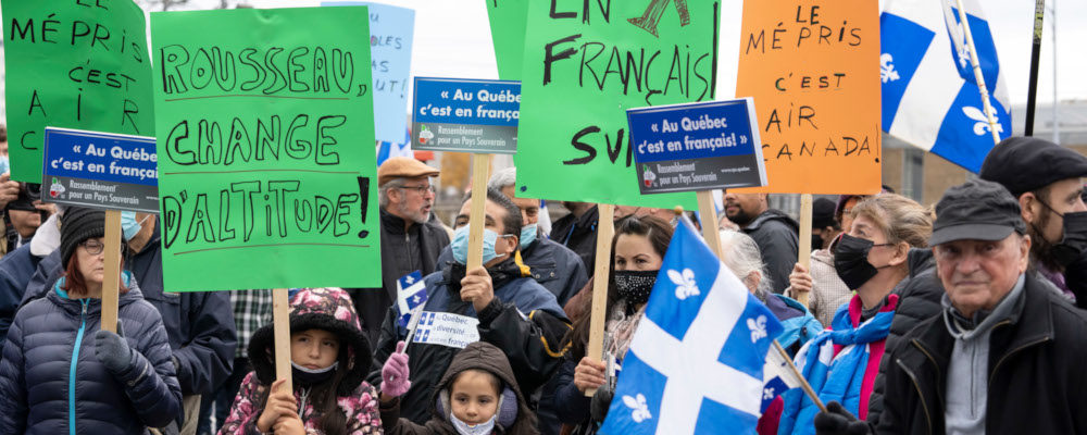 French language advocates protest Air Canada's chief executive Michael Rousseau's inability to speak French in front of the airline's head office during a demonstration in Montreal, Saturday, Nov. 13, 2021. Ryan Remiorz/THE CANADIAN PRESS.