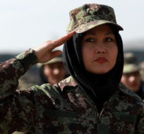 Newly graduated Afghan female National Army soldiers attend their graduation ceremony after a three month training program at the Afghan Military Academy in Kabul, Afghanistan, Sunday, Nov. 29, 2020. Rahmat Gul/AP Photo.