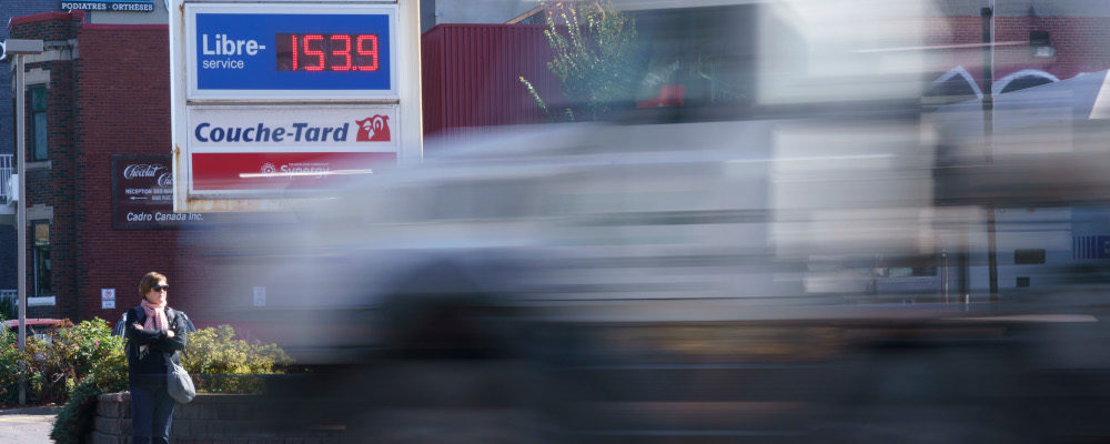 A truck drives by a gas station in Montreal on Wednesday, October 20, 2021. Paul Chiasson/The Canadian Press.
