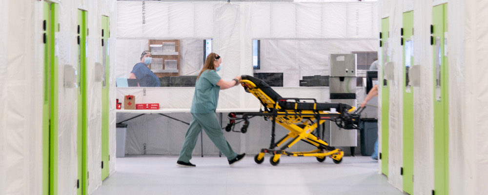 A health-care worker get equipment ready in a temporary addition to the Verdun Hospital in Montreal, on Wednesday, April 29, 2020. Paul Chiasson/The Canadian Press.
