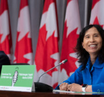 Chief Public Health Officer of Canada Dr. Theresa Tam and Deputy Chief Public Health Officer Dr. Howard Njoo react to a question asking if they would appear on TikTok for public health outreach on social media, during a news conference on the COVID-19 pandemic on Parliament Hill in Ottawa, on Friday, Aug. 21, 2020. Justin Tang/The Canadian Press. 