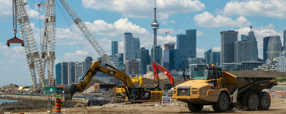 Construction crews work on the Port Lands renewal project in Toronto on Tuesday June 1, 2021. Frank Gunn/The Canadian Press.