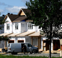 Home under construction are seen in a new subdivision in the Ottawa suburb of Kanata, on Friday, July 30, 2021. Justin Tang/The Canadian Press. 