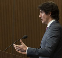 Prime Minister Justin Trudeau announces the Emergencies Act will be invoked to deal with protests on Feb. 14, 2022 in Ottawa. Adrian Wyld/The Canadian Press.
