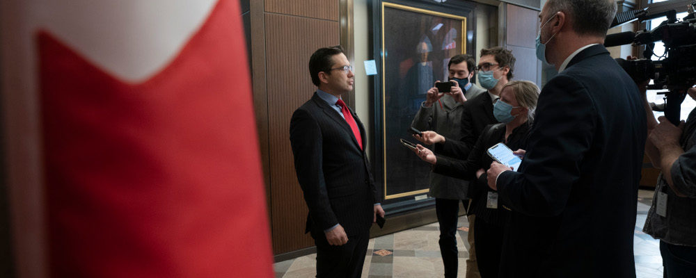 Conservative MP for Carleton Pierre Poilievre speaks with the media before attending Question Period, Wednesday, February 16, 2022 in Ottawa. Adrian Wyld/The Canadian Press.