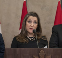 Public Safety Minister Marco Mendicino and Emergency Preparedness Minister Bill Blair look on as Finance Minister Chrystia Freeland speaks about the implementation of the Emergencies Act on Feb. 17, 2022 in Ottawa. Adrian Wyld/The Canadian Press.