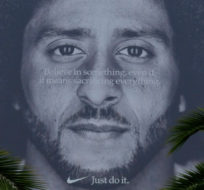 Palm trees frame a large billboard on top of a Nike store that shows former San Francisco 49ers quarterback Colin Kaepernick at Union Square, Wednesday, Sept. 5, 2018, in San Francisco. An endorsement deal between Nike and Colin Kaepernick prompted a flood of debate Tuesday as sports fans reacted to the apparel giant backing an athlete known mainly for starting a wave of protests among NFL players of police brutality, racial inequality and other social issues. Eric Risberg/AP Photo.