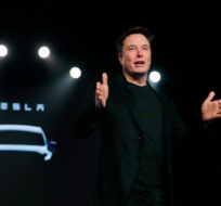 In this March 14, 2019, file photo Tesla CEO Elon Musk speaks before unveiling the Model Y at Tesla's design studio in Hawthorne, Calif. Jae C. Hong/AP Photo.