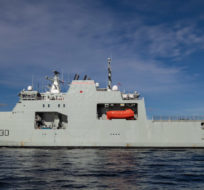 The Royal Canadian Navy's newest Arctic and Offshore Patrol Ship, HMCS Harry DeWolf, approaches port in Victoria, B.C., after arriving from Vancouver on Sunday, October 3, 2021. The ship is nearly halfway through its maiden operational deployment and recently crossed the Northwest Passage. When it returns to its home port of Halifax it will be the first Canadian warship since HMCS Labrador in 1954 to complete the circumnavigation of North America. Darryl Dyck/The Canadian Press.