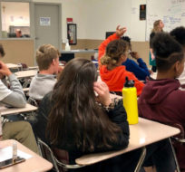 Instructors from Raphael House lead a classroom discussion about consent and healthy relationships with a class of sophomores at Central Catholic High School in Portland, Ore., on April 15, 2019. Gillian Flaccus/AP Photo.