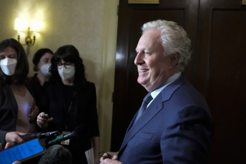 Former Quebec premier Jean Charest speaks to reporters as he arrives  for an event with potential caucus supporters as he considers a run for the leadership of the Conservative Party of Canada on March 2, 2022. Justin Tang/The Canadian Press.