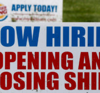 A row of signs advertising jobs are posted in front of a Burger King restaurant, Thursday, May 21, 2020, in Harmony, Pa. Keith Srakocic/AP Photo.