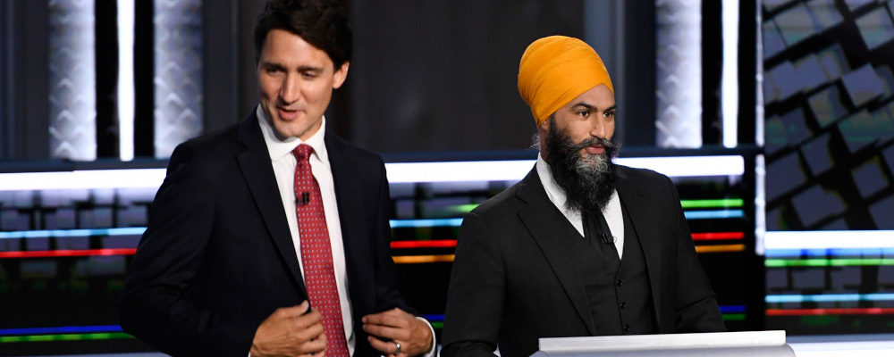 Liberal Leader Justin Trudeau, left, and NDP Leader Jagmeet Singh, prepare for the start of the federal election English-language Leaders debate in Gatineau, Que., on Thursday, Sept. 9, 2021. Justin Tang/The Canadian Press.