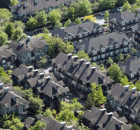 A neighbourhood of townhouses is seen in an aerial view in Richmond, B.C., on Wednesday May 16, 2018. Darryl Dyck/The Canadian Press.
