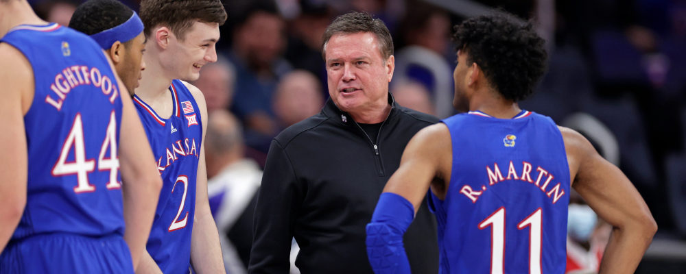 Kansas head coach Bill Self talks with his players during a timeout during the second half of the team's NCAA college basketball game against St. John's on Friday, Dec. 3, 2021, in Elmont, N.Y. Adam Hunger/AP Photo.