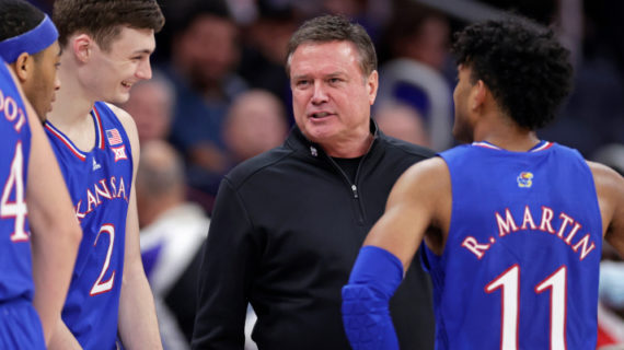 Kansas head coach Bill Self talks with his players during a timeout during the second half of the team's NCAA college basketball game against St. John's on Friday, Dec. 3, 2021, in Elmont, N.Y. Adam Hunger/AP Photo.