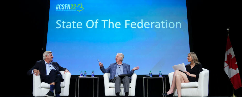 Mike Harris and Preston Manning take part in a panel discussion during the Canada Strong and Free conference in Ottawa on Friday, May 6, 2022. Sean Kilpatrick/The Canadian Press.