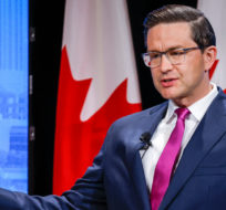 Candidate Pierre Poilievre makes a point at the Conservative Party of Canada English leadership debate in Edmonton, Alta., Wednesday, May 11, 2022. Jeff McIntosh/The Canadian Press.