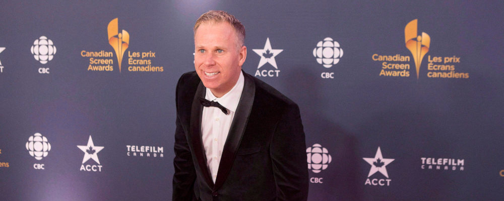 Gerry Dee poses for a photo as he arrives at the Canadian Screen Awards in Toronto on Sunday March 9, 2014. Chris Young/The Canadian Press.