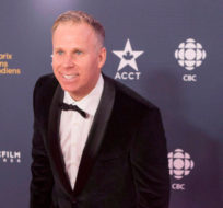 Gerry Dee poses for a photo as he arrives at the Canadian Screen Awards in Toronto on Sunday March 9, 2014. Chris Young/The Canadian Press.