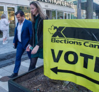 Voters line up at the Halifax Convention Centre as they prepare to vote in the federal election in Halifax on Monday, Sept. 20, 2021. Andrew Vaughan/The Canadian Press.