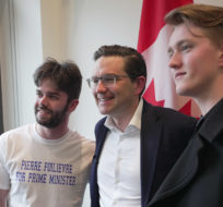 Federal Conservative leadership candidate Pierre Poilievre, centre, poses for photographs with supporters during a meet and greet at the University of British Columbia in Vancouver on Thursday, April 7, 2022. Darryl Dyck/The Canadian Press.
