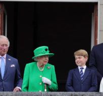 From left, Camilla, Duchess of Cornwall, Prince Charles, Queen Elizabeth II, Prince George, Prince William, Princess Charlotte, Prince Louis and Kate, Duchess of Cambridge stand on the balcony, at the end of the Platinum Jubilee Pageant held outside Buckingham Palace, in London, Sunday June 5, 2022, on the last of four days of celebrations to mark the Platinum Jubilee. Chris Jackson/AP Photo.