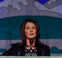 Then-Wildrose Leader Danielle Smith addresses party faithful at their annual meeting in Red Deer, Alta., Friday, Nov. 14, 2014. Jeff McIntosh/The Canadian Press.