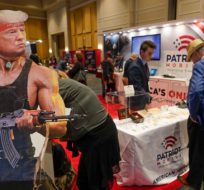 A cardboard cutout of Donald Trump is seen at a booth at a trade show at the Conservative Political Action Conference (CPAC) Friday, Feb. 25, 2022, in Orlando, Fla. John Raoux/AP Photo.