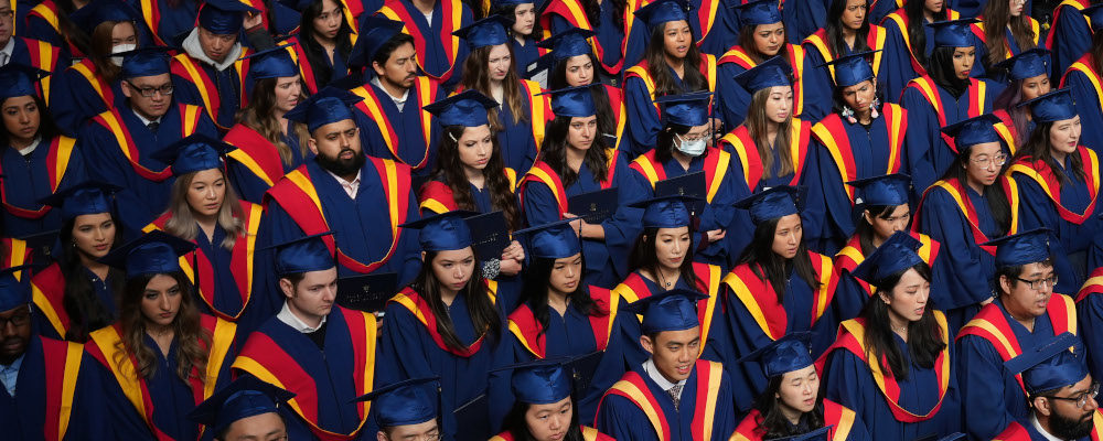 Spring 2020 graduates listen during a convocation ceremony at Simon Fraser University, in Burnaby, B.C., on Friday, May 6, 2022. Darryl Dyck/The Canadian Press.