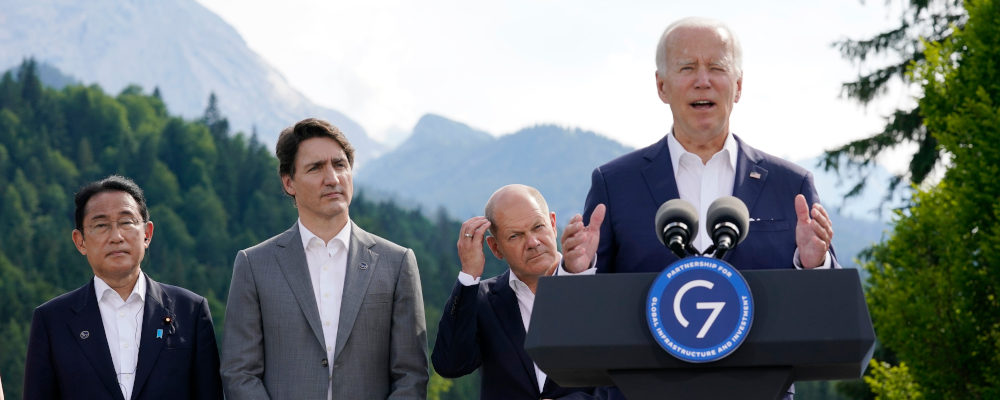 U.S. President Joe Biden, with from left, Fumio Kishida, Prime Minister of Japan, Justin Trudeau, Prime Minister of Canada and German Chancellor Olaf Scholz, speaks and formally launches the global infrastructure partnership, on the margins of the G7 Summit in Elmau, Germany, Sunday, June 26, 2022. Susan Walsh/AP Photo.