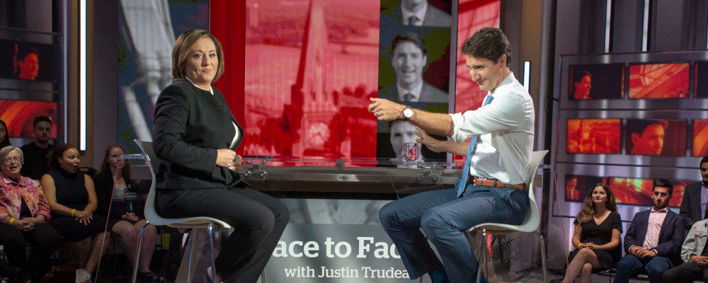 Liberal leader Justin Trudeau greets the audience as he sits down with host Rosie Barton for a recording of CBC Face to Face Townhall, Monday, September 30, 2019  in Toronto. Ryan Remiorz/The Canadian Press.