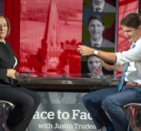Liberal leader Justin Trudeau greets the audience as he sits down with host Rosie Barton for a recording of CBC Face to Face Townhall, Monday, September 30, 2019  in Toronto. Ryan Remiorz/The Canadian Press.
