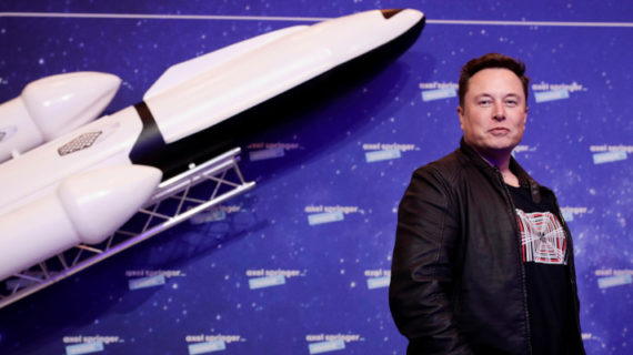 SpaceX owner and Tesla CEO Elon Musk arrives on the red carpet for the Axel Springer media award, in Berlin, Germany, Tuesday, Dec. 1, 2020. Hannibal Hanschke/Pool via AP.